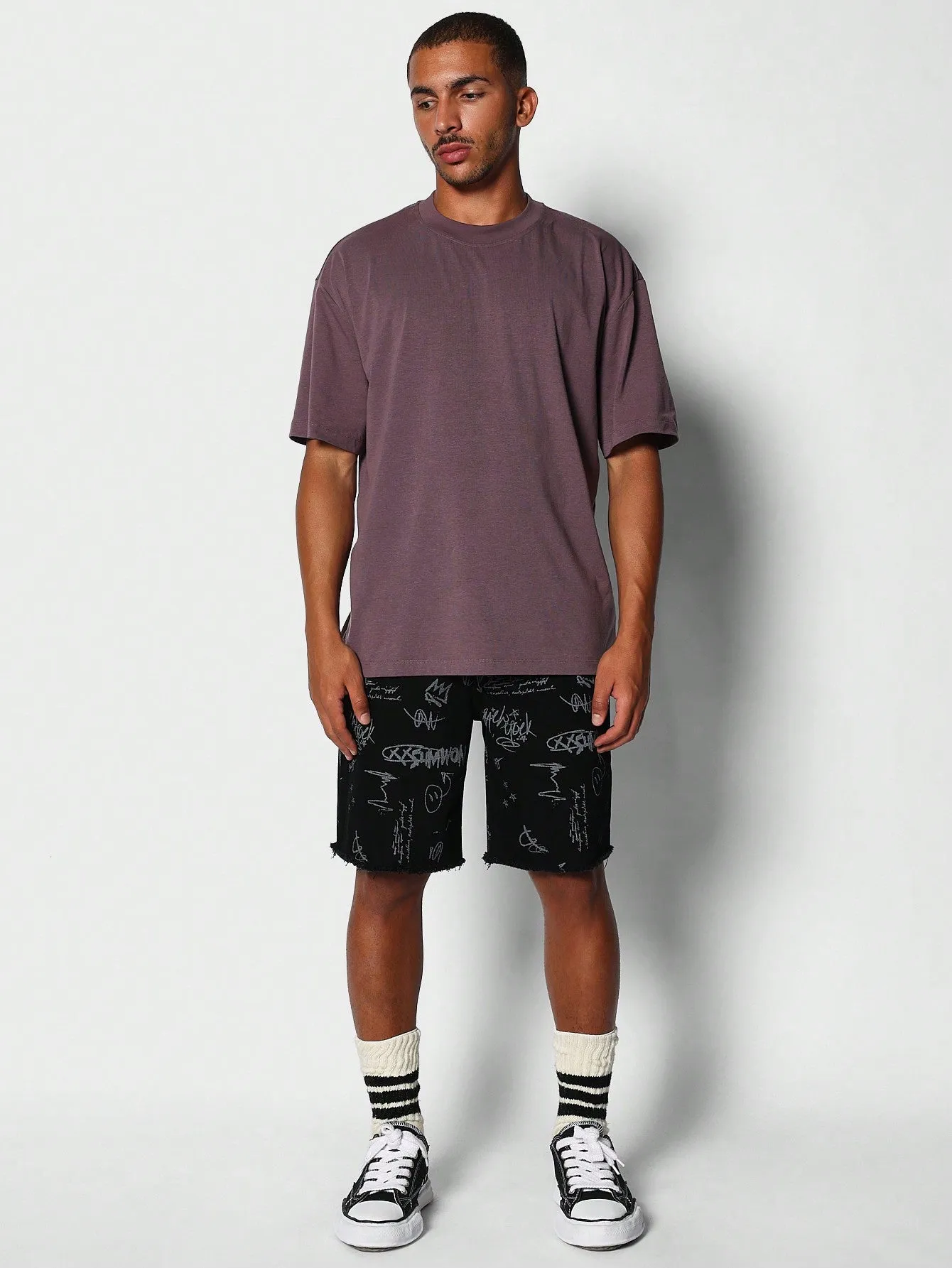 Denim Short With Raw Edge Detail And Doodle Print
