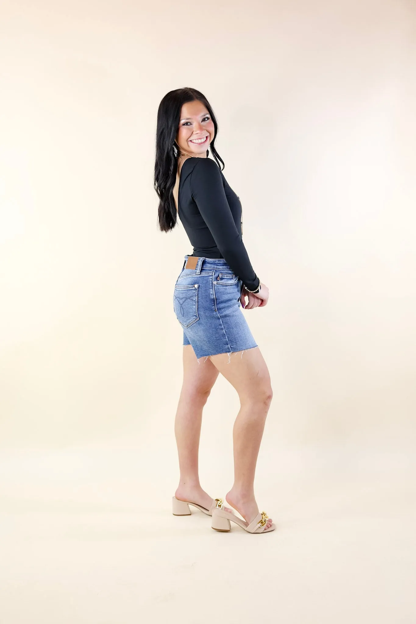 Judy Blue | By Popular Demand Mid Thigh Cut Off Hem Shorts in Light Wash