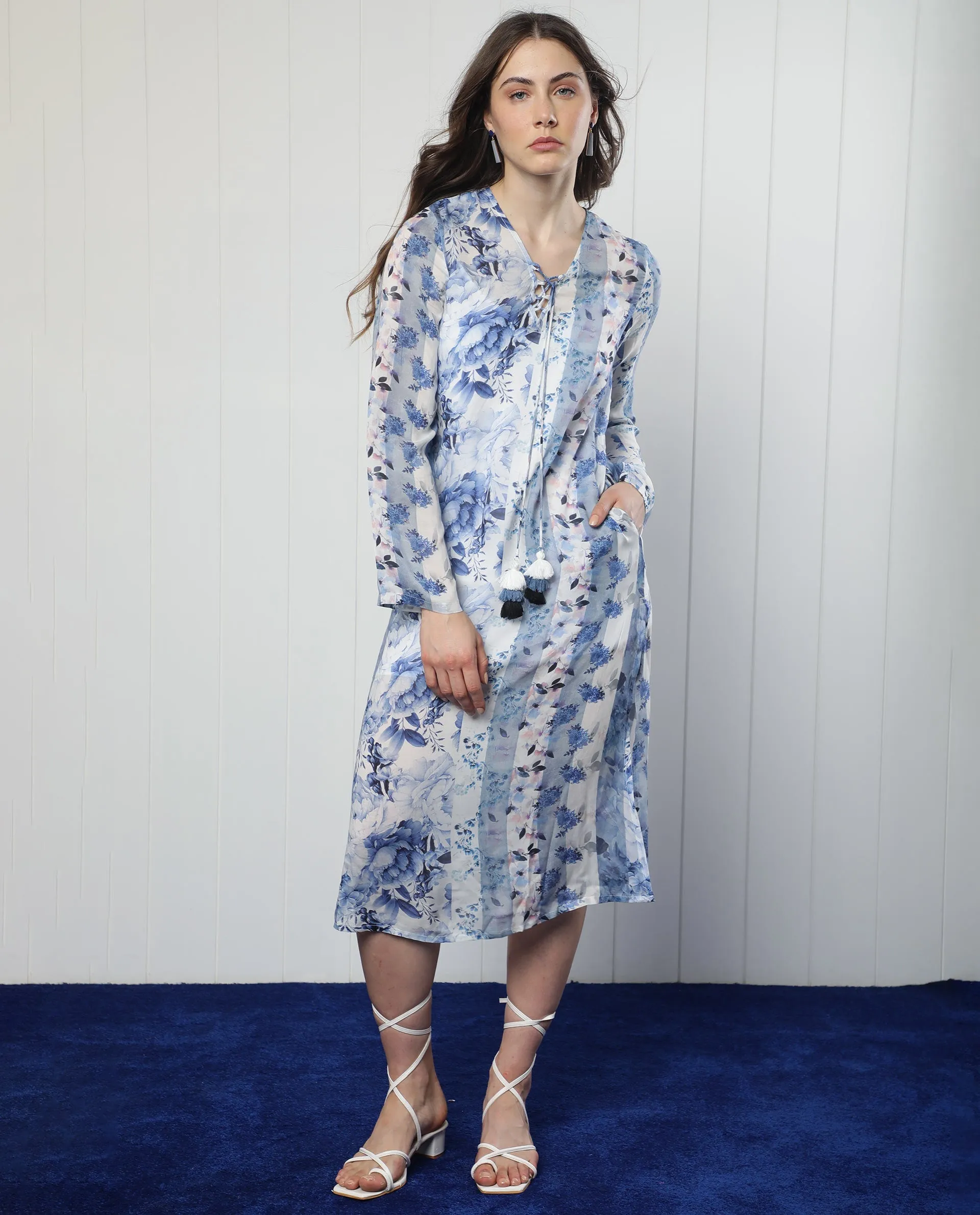 Rareism Women Shay Light Blue Modal Fabric 3/4Th Sleeves Tie-Up Closure Tie-Up Neck Relaxed Fit Floral Print Knee Length Shrug
