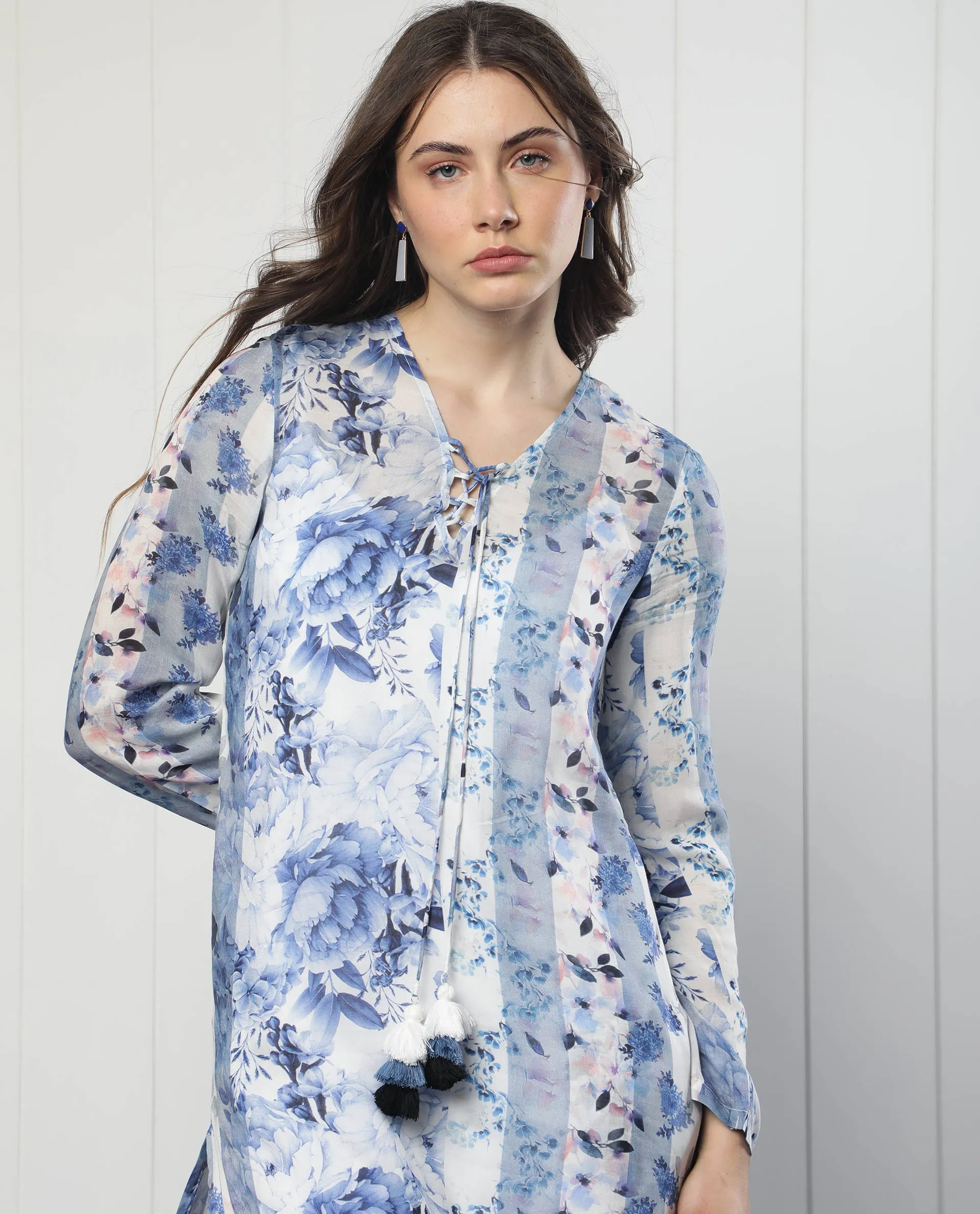 Rareism Women Shay Light Blue Modal Fabric 3/4Th Sleeves Tie-Up Closure Tie-Up Neck Relaxed Fit Floral Print Knee Length Shrug
